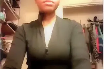 Big boobed ebony girl plays with her shaved cameltoe pussy on the floor - porn video