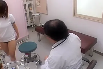 Japanese girl is examined by the gynecologist in spy video - porn video