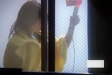 Asian girl dries out hair and masturbates on window spy cam (fake) - porn video