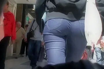 Street candid video of a fitty walking ass and pussy in tight jean shorts - porn video