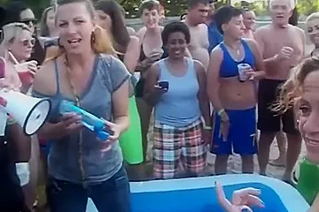 Bikini chicks wrestling for an audience - porn video