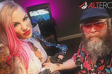 Busty babe Evilyn Ink tattoos Ivan then masturbates - porn video