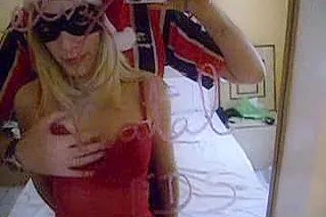 Long-legged buxom blonde celebrates Christmas in her own way - porn video