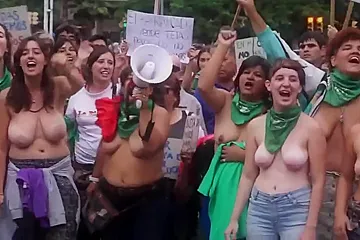 Topless Argentinian protesters with big boobs - porn video