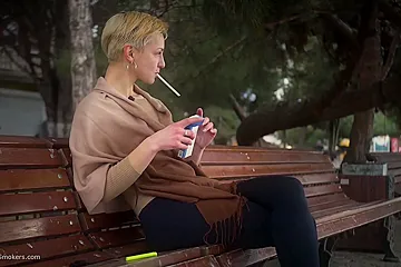 Short Cut Hair Blonde Girl Is Smoking All White 120mm Cigarettes - porn video