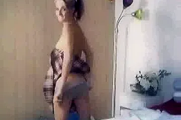 Slim blonde strips playfully for the amateur cam - porn video
