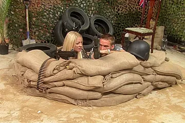 Beautiful gals get screwed hard during war time - porn video